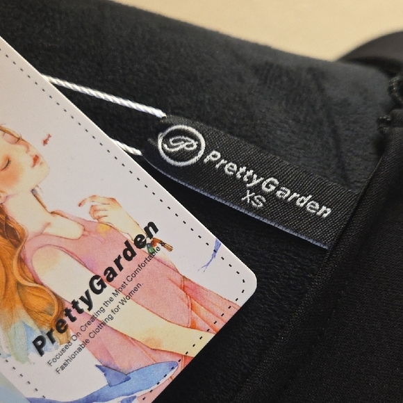 Elegant Black Sleeveless Mini Dress - Picture 2 of 16